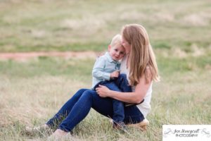 Littleton family photographer Ken Caryl Valley Colorado photography red rock formations mother son candid moment unposed