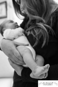 Littleton family photographer mother son baby boy newborn new in home lifestyle black and white Denver photography nursery