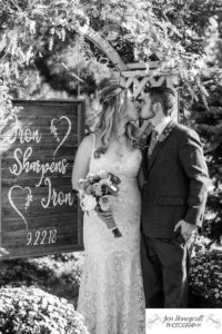 Littleton wedding photographer iron sharpens iron bride and groom married marriage backyard Colorado fall photography kiss love