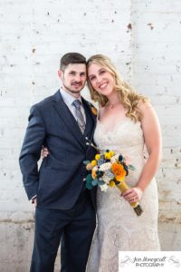 Littleton wedding photographer Colorado urban bride and groom married marriage The Studios at Overland Crossing photography love dress fall