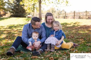 Littleton family photographer fall in Colorado leaves girls sisters toddler baby girl Stone House Lakewood