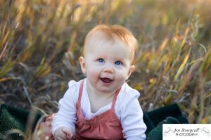 Littleton family photographer ginger baby red head cute girl seven months old milestone sitting up Lakewood fall in Colorado