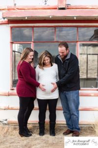 Littleton family photographer maternity session baby bump surrogate surrogacy pregnant pregnancy sisters love Lakewood Heritage Center fall in Colorado photography parents to be couples hands on belly