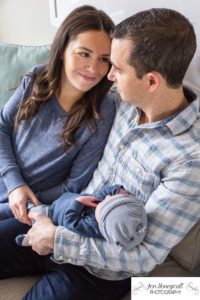 Littleton family photographer newborn new baby boy in home lifestyle photography session photo in love sleeping Solterra Lakewood parents parenthood Colorado