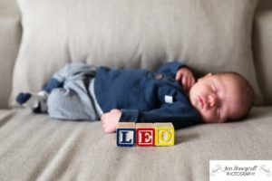 Littleton family photographer newborn new baby boy in home lifestyle photography session photo dog doggie sleeping Solterra Lakewood parents parenthood Colorado