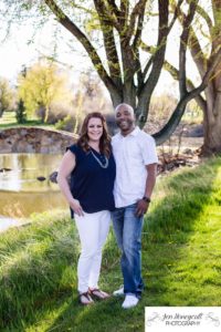 Littleton family photographer engagement session engaged wedding husband and wife to be Lakewood Country Club spring couple in love sunset green golf course bridge stone save the date announcement photography Colorado