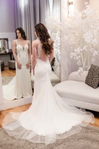 Littleton wedding photographer bride bridal portrait dress white train flowing The Falls Event Center Colorado photography