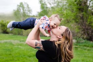 Littleton family photographer child baby mother daughter Hildebrand Ranch Colorado foothills spring photography Jefferson County fun laughter nature