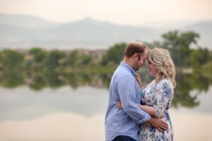 Littleton family photographer couples in love lake summer couple Colorado golden hour sunset forehead snuggles married marriage