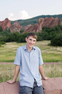 Littleton senior photographer high school boy Arvada Roxborough State Park red rock formations class of 2019