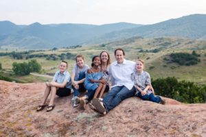 Littleton family photographer South Valley Open Space park Ken Caryl red rocks rock formations Colorado foothills photography mountain view adoption kids children boys girls