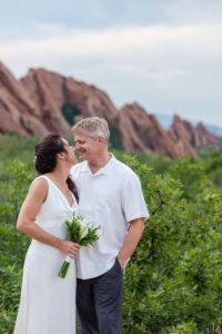 Littleton wedding photographer bride groom nose to love Roxborough State Park red rock formations
