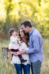 Littleton family photographer Lair O' the Bear park Jefferson County Colorado trail photography creek fall colors little girl daughter fun candid unposed parenthood life