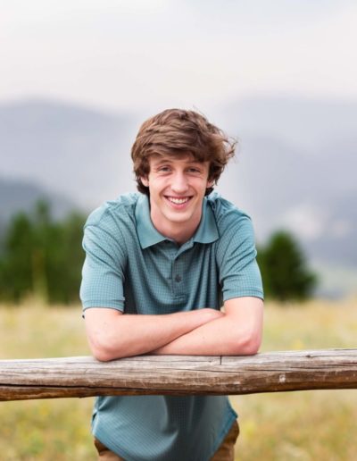 Littleton high school senior photographer Colorado Mt. Falcon park Arapahoe schools baseball player catcher boy mountain view handsome friendly kid