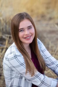Littleton high school senior portrait photographer in Colorado Broomfield track team cross country girl runner violin player violinist braces college bound class of 2020
