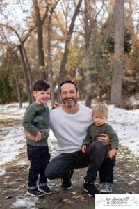 Littleton family photographer Fly'N B park in Highlands Ranch Colorado photography boys brothers pregnant baby bump mom dog Yorkie snow fall trail boys sons father