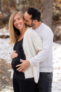 Littleton maternity family photographer baby bump mom to be expecting cute snow outdoor natural light photography in Colorado