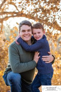 Littleton family photographer in Colorado at Writer's Vista park Centennial Highline Trail fall leaves golden hour sunset light big brother little sister kids children natural smiles real life parenthood