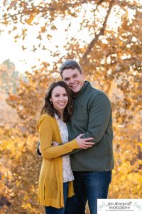 Littleton family photographer in Colorado at Writer's Vista park Centennial Highline Trail fall leaves golden hour sunset light big brother little sister kids children natural smiles real life parenthood