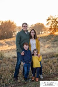 Littleton family photographer in Colorado at Writer's Vista park Centennial Highline Trail fall leaves golden hour sunset light big brother little sister kids children natural smiles real life parenthood