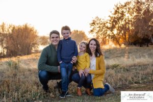 Littleton family photographer in Colorado at Writer's Vista park Centennial Highline Trail fall leaves golden hour sunset light big brother little sister kids children natural smiles real life parenthood