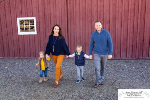 Littleton family photographer in Colorado at the Lakewood Heritage Center with kids children big brother little sister old barns joy Christmas snuggles cold fall winter