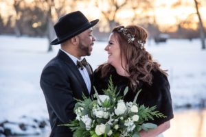 Littleton Colorado wedding photographer bride and groom sunset fedora hat snow winter Lakewood Country Club and golf course marriage