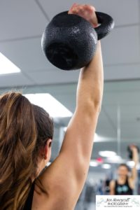 Littleton branding photographer headshot business entrepreneur Colorado health fitness faith spiritual physical diet lifestyle photo session images home gym working out eating food healthy cross training business woman work