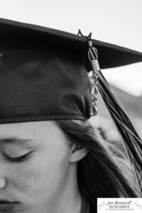 Littleton high school senior portrait photographer cap and gown photo session Morrison Mt. Falcon red rocks class of 2020 Broomfield CSU Colorado State University mask pandemic quarantine graduate graduation tassle summer