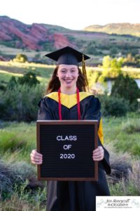 Littleton high school senior portrait photographer cap and gown photo session Morrison Mt. Falcon red rocks class of 2020 Broomfield CSU Colorado State University mask pandemic quarantine graduate graduation tassle summer