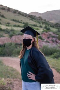 Littleton high school senior portrait photographer cap and gown photo session Morrison Mt. Falcon red rocks class of 2020 Broomfield CSU Colorado State University mask pandemic quarantine graduate graduation tassle summer