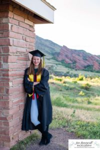 Littleton high school senior portrait photographer cap and gown photo session Morrison Mt. Falcon red rocks class of 2020 Broomfield CSU Colorado State University mask pandemic quarantine graduate graduation tassle summer