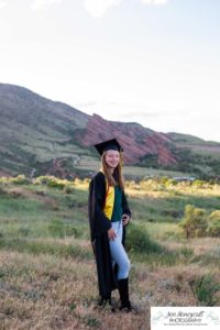 Littleton high school senior portrait photographer cap and gown photo session Morrison Mt. Falcon red rocks class of 2020 Broomfield CSU Colorado State University mask pandemic quarantine graduate graduation tassle summer