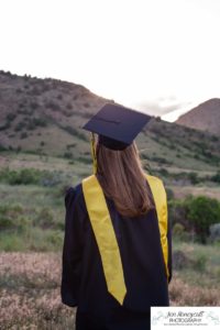 Littleton high school senior portrait photographer cap and gown photo session Morrison Mt. Falcon red rocks class of 2020 Broomfield CSU Colorado State University mask pandemic quarantine graduate graduation tassle summer