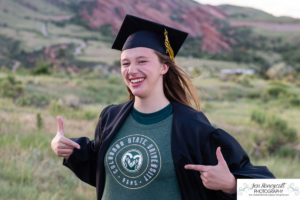 Littleton high school senior portrait photographer cap and gown photo session Morrison Mt. Falcon red rocks class of 2020 Broomfield CSU Colorado State University mask pandemic quarantine graduate graduation tassle summer