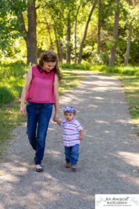 Littleton family and child photographer in Colorado one year old milestone session little boy hat Fly'N B park Highlands Ranch summer momma's boy mother son cute baby pandemic birthday COVID-19 corona virus walking Highline Trail