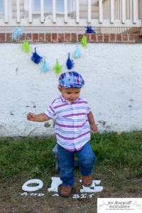 Littleton family and child photographer in Colorado one year old milestone session little boy hat Fly'N B park Highlands Ranch summer momma's boy mother son cute baby pandemic birthday COVID-19 corona virus