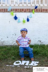 Littleton family and child photographer in Colorado one year old milestone session little boy hat Fly'N B park Highlands Ranch summer momma's boy mother son cute baby pandemic birthday COVID-19 corona virus