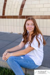 Littleton high school senior photographer in Colorado at the Lakewood Heritage Center teenager teen girl class of 2021 cross country runner summer natural light photographer Mountain Vista Highlands Ranch