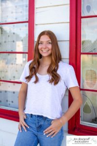 Littleton high school senior photographer in Colorado at the Lakewood Heritage Center teenager teen girl class of 2021 cross country runner summer natural light photographer Mountain Vista Highlands Ranch