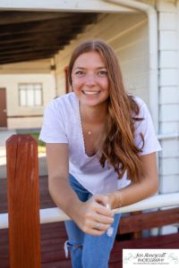 Littleton high school senior photographer in Colorado at the Lakewood Heritage Center teenager teen girl class of 2021 cross country runner summer natural light photographer Mountain Vista Highlands Ranch