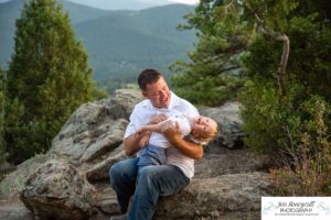 Littleton family photographer in Colorado at Mt. Falcon park mountain views view of foothills boy mother father son love summer sunset natural light photography