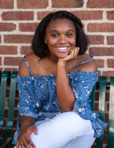 Littleton high school senior photographer Colorado Arapahoe soccer team player girl beautiful urban downtown Morrison Mt. Falcon red rocks rock formations summer class of 2021