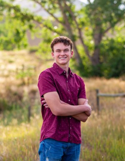 Littleton high school teen senior photographer Chatfield swimmer swim team South Valley Open Space park red rocks rock formations boy handsome tall grasses class of 2021 summer graduate college bound engineer
