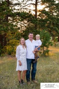 Littleton family photographer in Colorado at Mt. Falcon park mountain views view of foothills boy mother father son love summer sunset natural light photography