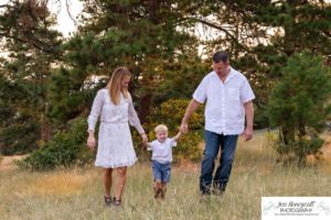 Littleton family photographer in Colorado at Mt. Falcon park mountain views view of foothills boy mother father son love summer sunset natural light photography