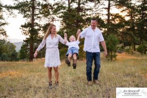 Littleton family photographer in Colorado at Mt. Falcon park mountain views view of foothills boy mother father son love summer sunset natural light photography