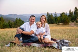 Littleton family photographer in Colorado at Mt. Falcon park mountain views view of foothills boy mother father son love summer sunset natural light photography