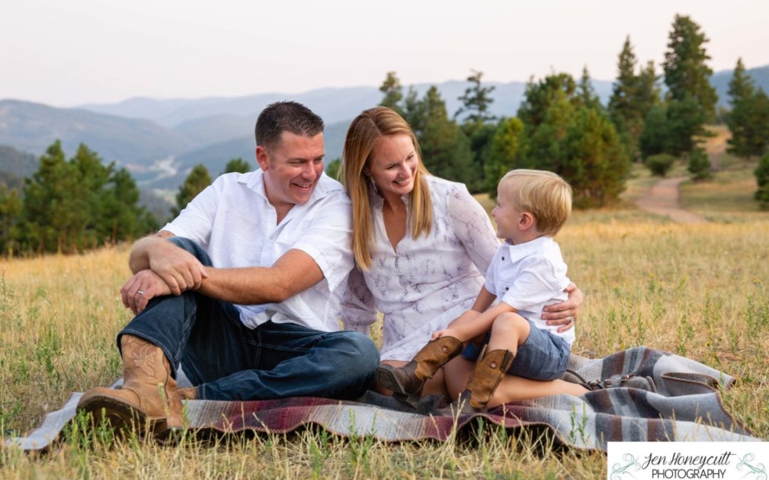 The {S} family of 3 at Mt. Falcon park by Littleton, CO photographer