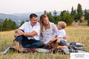 Littleton family photographer in Colorado at Mt. Falcon park mountain views view of foothills boy mother father son love summer sunset natural light photography